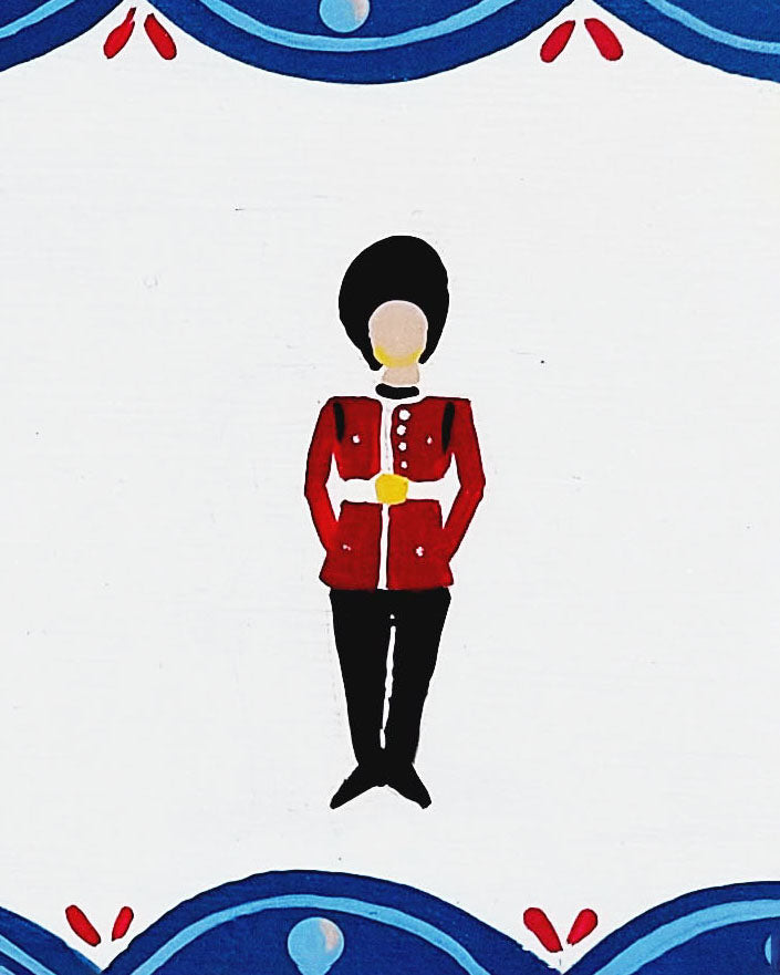 Nursery door sign personalised with the name 'Jack', featuring striking grenadier guards aand a decorative blue scalloped border, perfect for baby room decor.