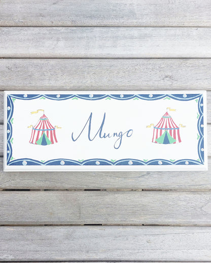 Nursery door sign personalised with the name 'Mungo', featuring Circus big tops and a decorative blue scallop border, perfect for baby room decor.