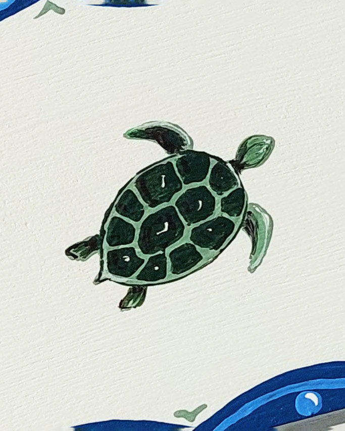 Close-up of a nursery door sign personalised with the name 'Robert', featuring adorable sea turtles and a decorative blue scalloped border, perfect for baby room decor.