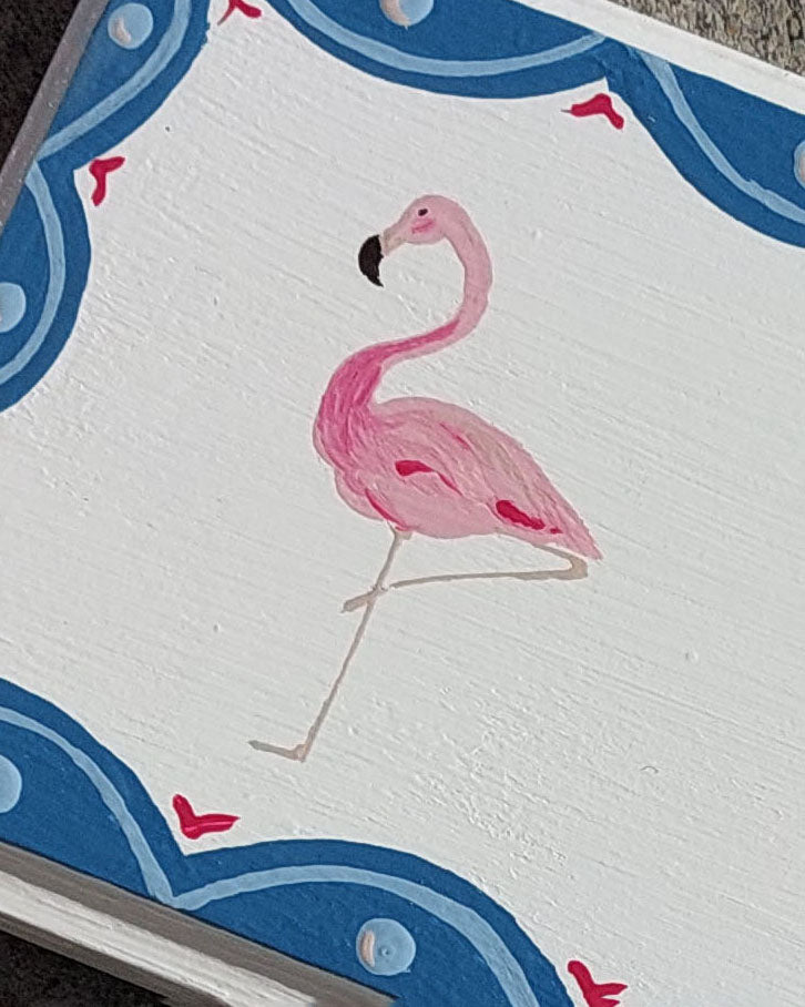 Nursery door sign personalised with the name 'Freya', featuring majestic flamingoes and a decorative blue scalloped border, perfect for baby room decor.