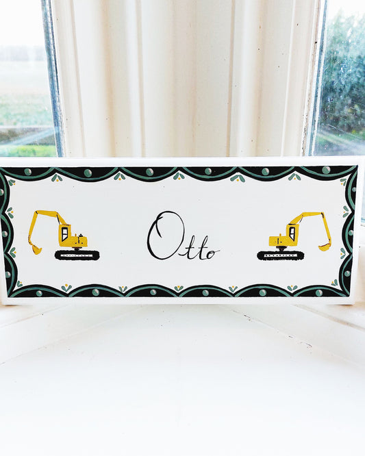 Nursery door sign personalised with the name 'Otto', featuring construction diggers and a decorative blue and green scallop border, perfect for baby room decor.