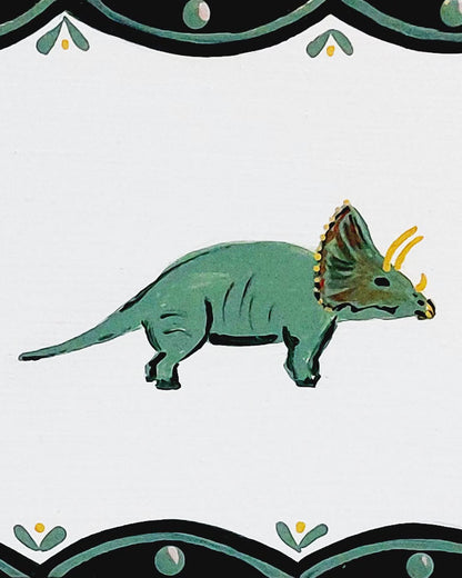 Nursery door sign personalised with the name 'Artie', featuring historic dinosaurs and a decorative blue and green scallop border, perfect for baby room decor.