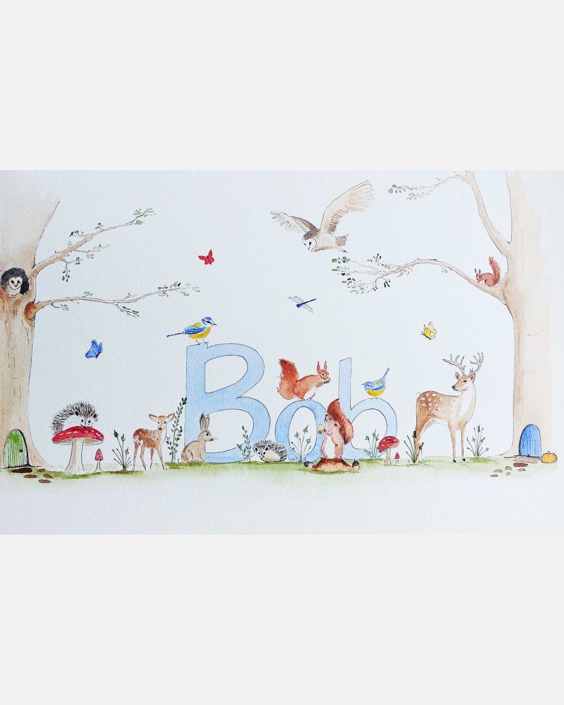 Hand-painted watercolour name painting for nursery decor, featuring the name 'Bob', personalised with a woodland animals theme, perfect for children's room wall art.