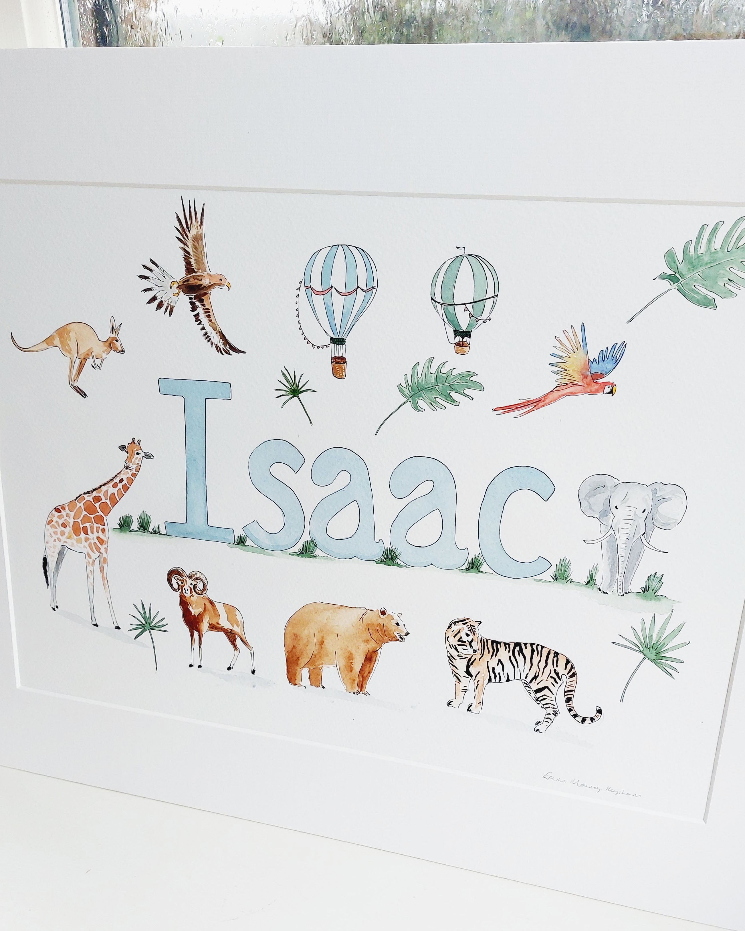 Hand-painted watercolour name painting for nursery decor, featuring the name 'Isaac', personalised with a safari theme, perfect for children's room wall art.